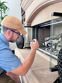 Home inspector inspecting Fireplace