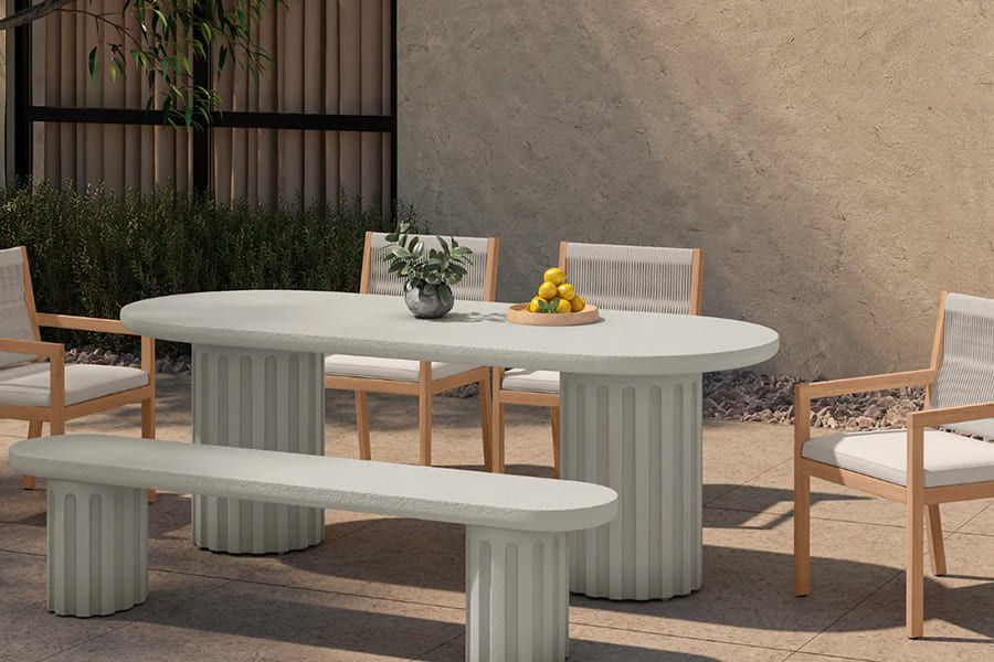 Table extérieur salle à manger forme pillule 6 à 8 places assises en béton renforcé de fibre de verre Eris