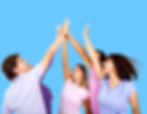 Diverse team giving a high-five against a blue background, reflecting corporate team building events, collaborative culture,