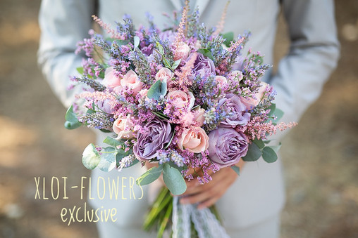 David Austin roses in lilac shade with lavender and pink astilbe.