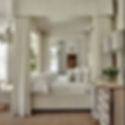 Neutral cream bedroom with canopy bed