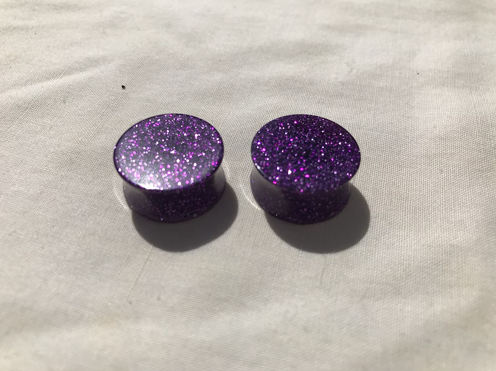Thumbnail: Double flared ear gauges 