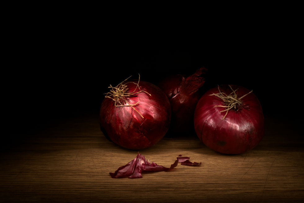 Three red onions