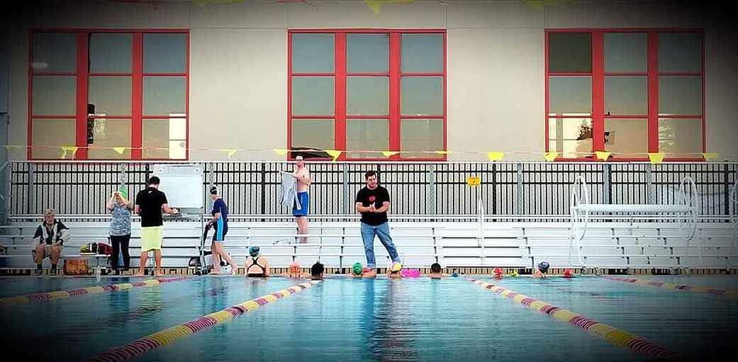 Coach Ronny coaching an age group practice