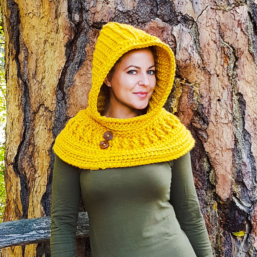 Harmony Hooded Cowl Crochet Pattern: Front angled view of a model wearing the cowl