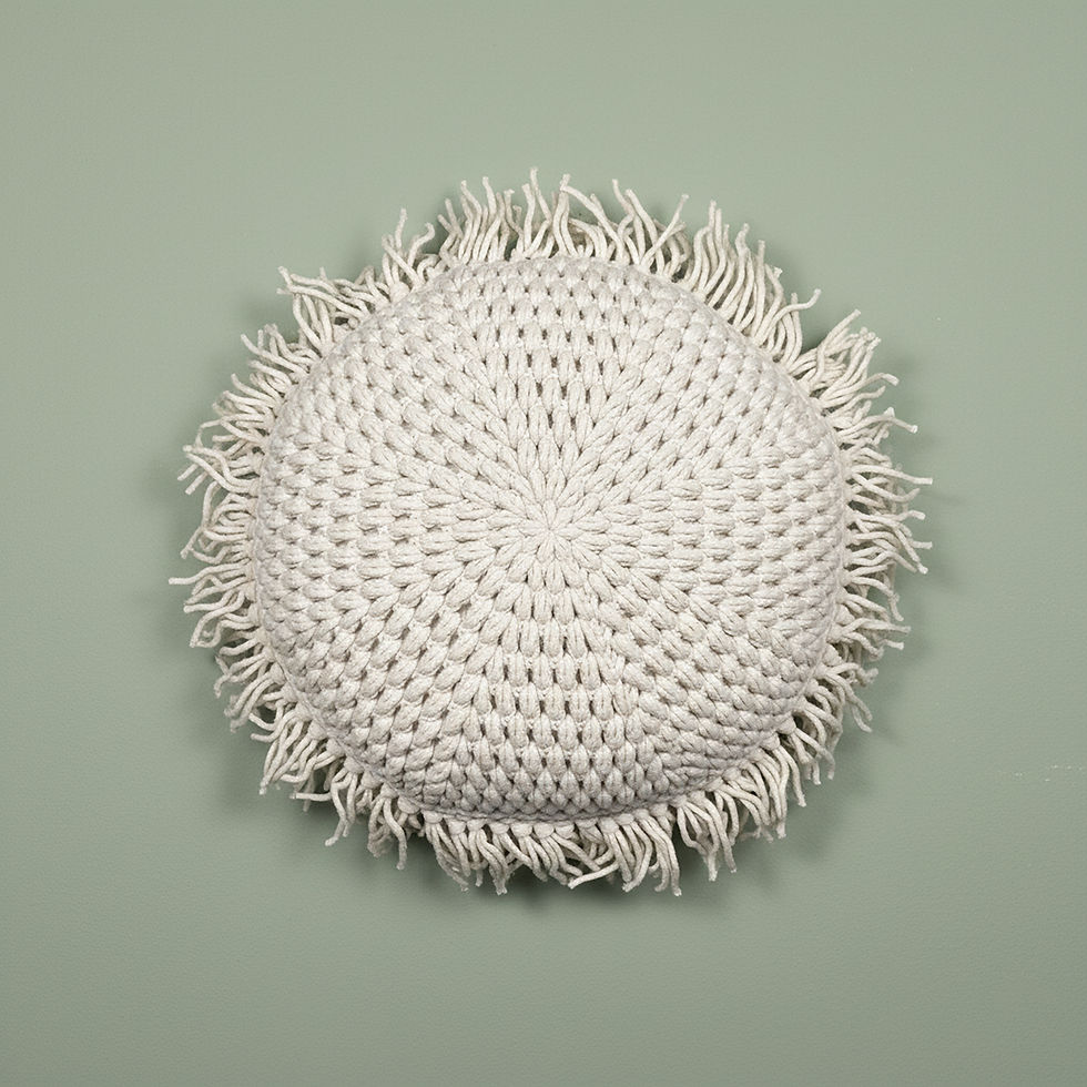 Floret Throw Pillow crochet pattern, shown as a flat lay with the pillow isolated against a background.