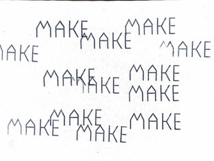 text of the word 'make' on paper repeatedly