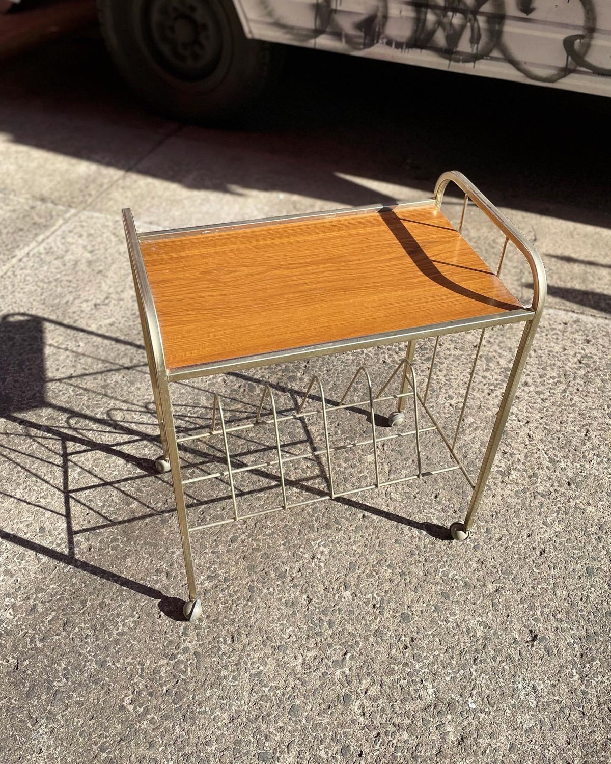 Astonishing Mid-Century Gold Chrome Magazine Rack on Original Castors
