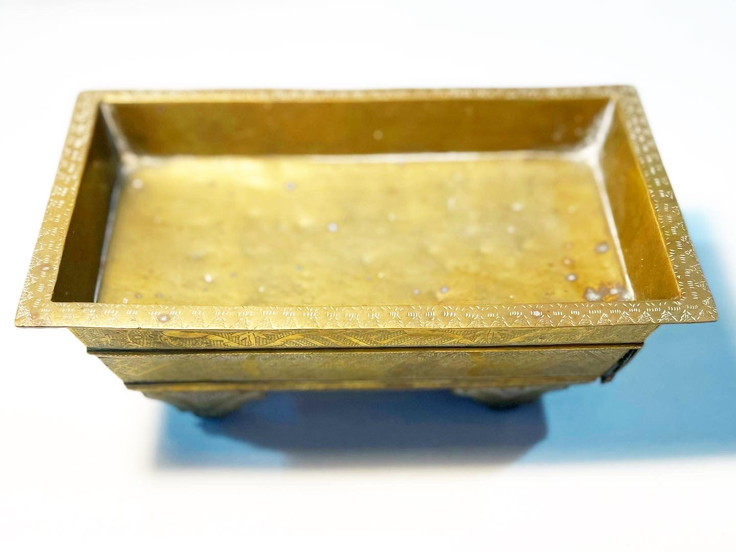 Spectacular Antique Vigorously Embossed Brass Box with Hidden Drawer on Castors