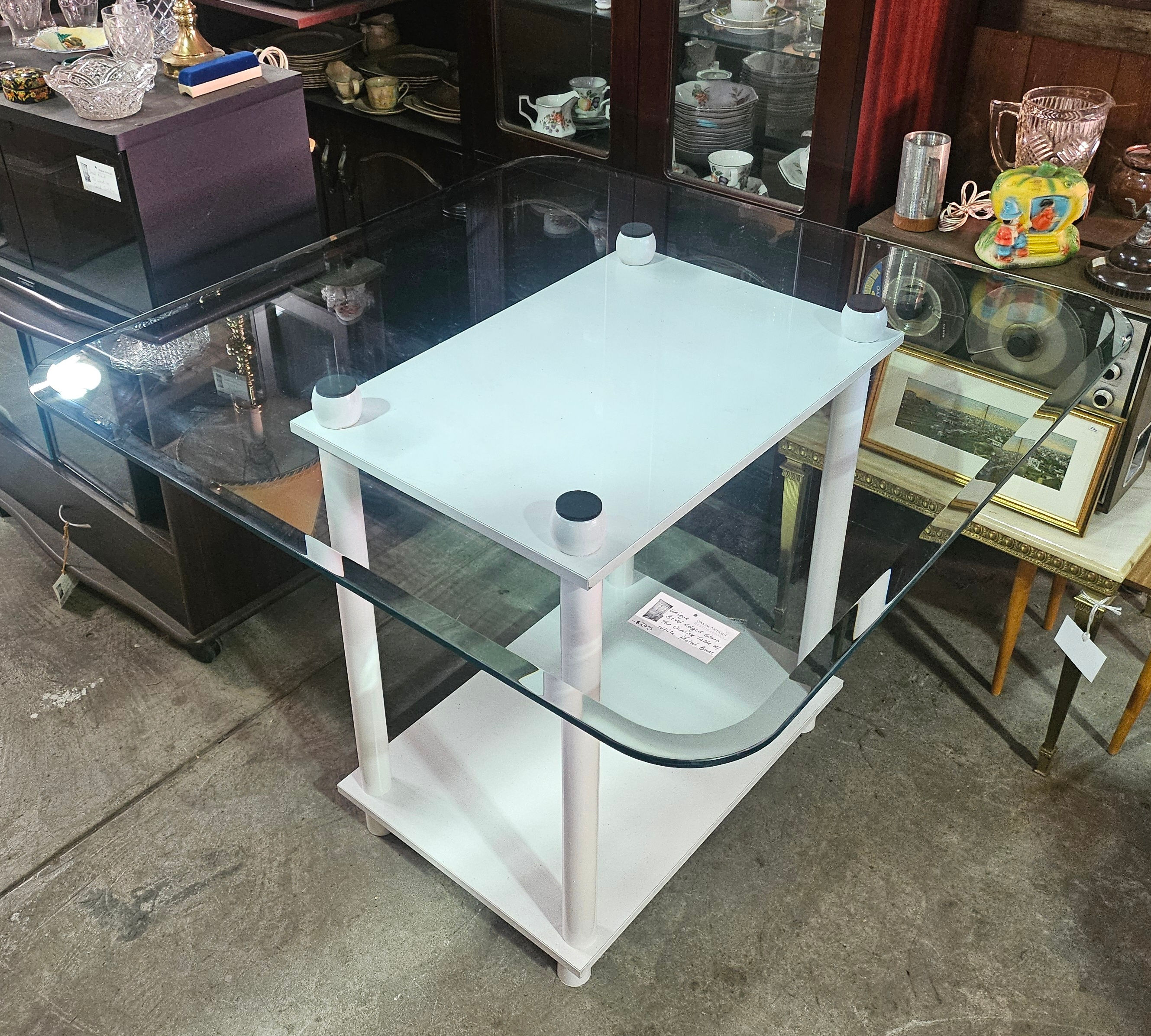 Dining Table: Unique Bevel Edged Glass Top Dining Table W/ White Metal Base