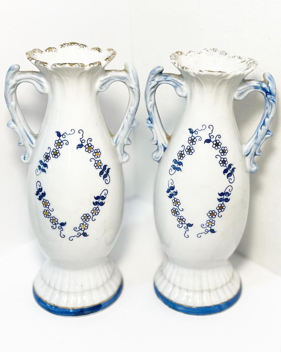 Thumbnail: Beautiful Pair of Ornate Porcelain Vases with Figurines sitting in the middle (I
