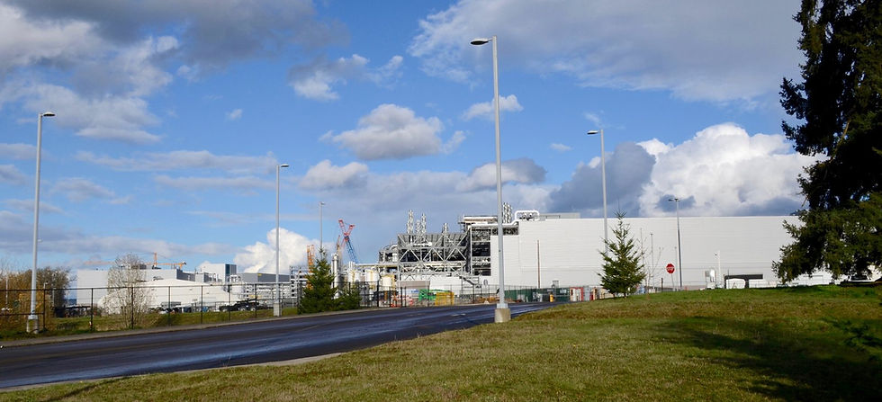 Large white semiconductor production buildings at Intel's Ronler Acres campus in Hillsboro, Oregon.