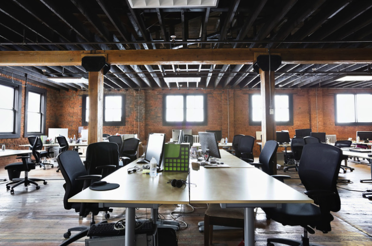 Installer fitting office workstation components