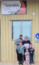 Caleb Bullock and wife, Jacinta, with their family