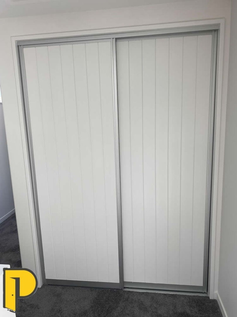 Whisper slider pair, Grooved Avon MDF panel, sliver tracks and frames - Paraparaumu Doors & Joinery - Kapiti, Wellington
