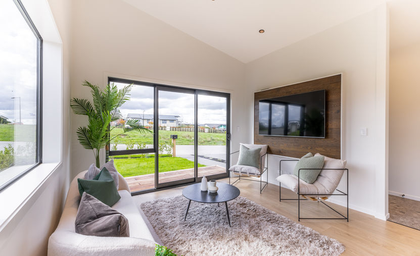 Cozy lounge area with feature TV wall