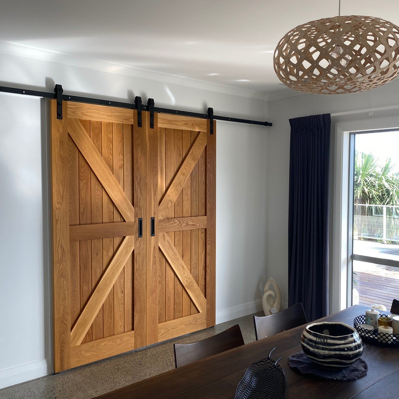 Custom built interior barn door - American Oak stained wood with black classic track - Par