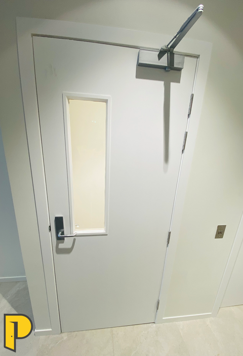 60 min fire door, with Glass panel, fire rated closer and mortice passage handle fitted- Paraparaumu Doors & Joinery - Kapiti, Wellington