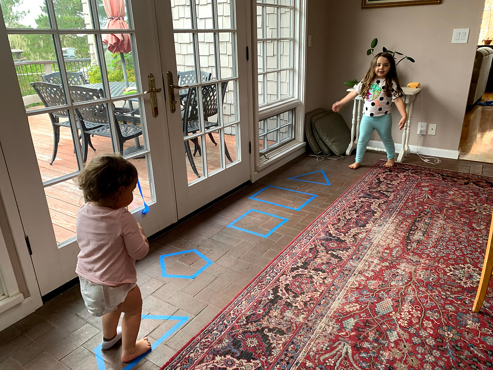 Hopscotch and taking turns running through the shapes
