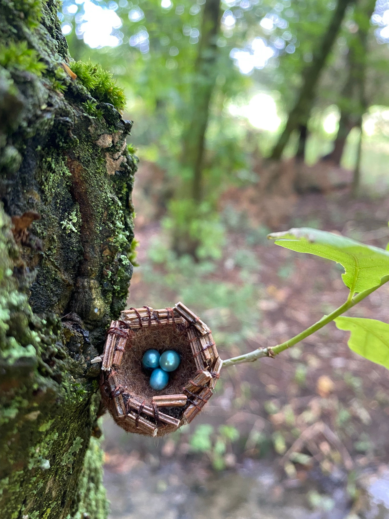 Embroidered wool sculpture nest ring with pearl eggs