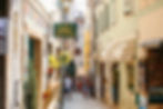 People wandering through the cobblestone streets of Old Town Rovinj
