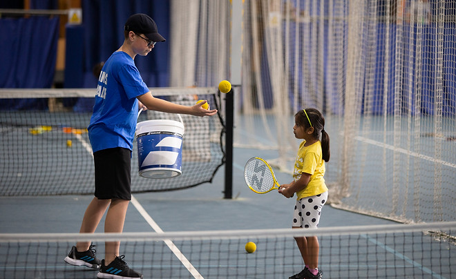 Tennis leader and a child