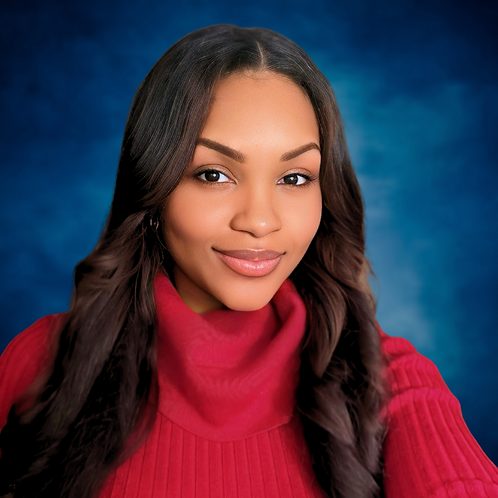 Professional headshot of Kierra Nicole, smiling, against a neutral background. Kierra is the founder and creative force behind the website, offering specialized services in virtual assistance, web, and graphic design..png