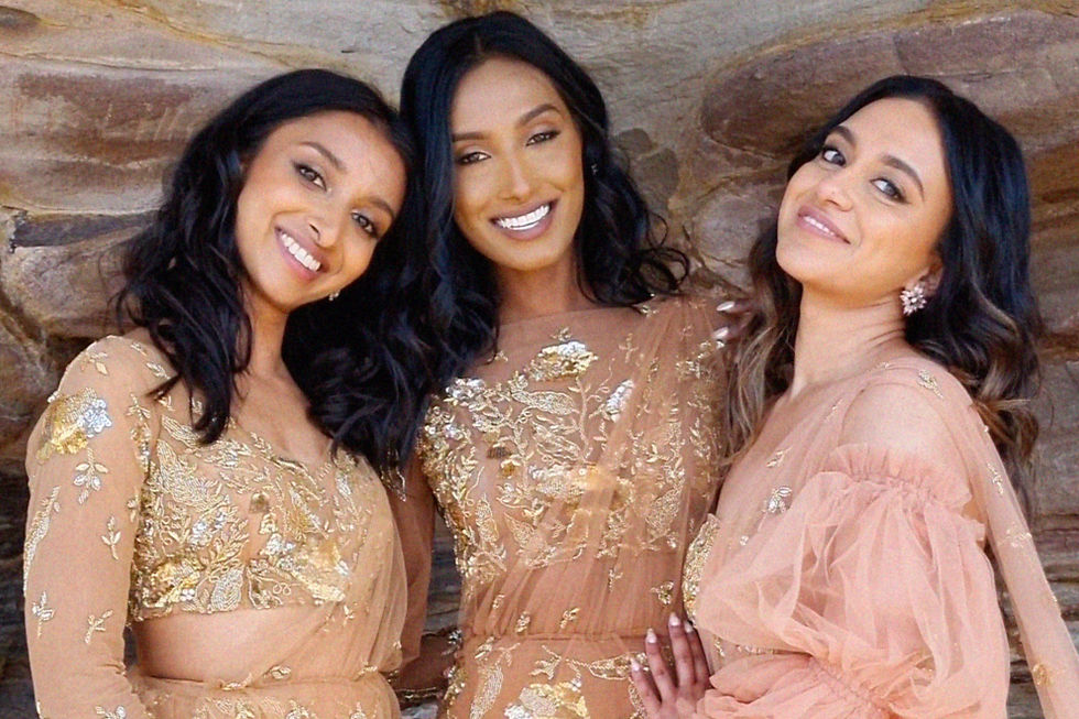 Three South Asian women displaying Gather and Stitches Clothing Line