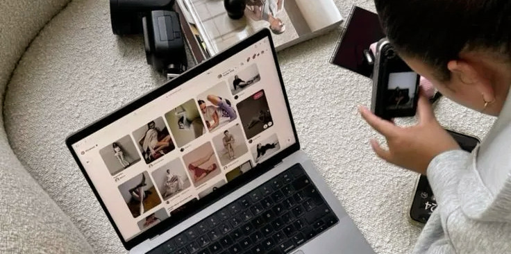 Person using social media marketing services on a laptop