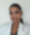 Smiling female doctor in white coat