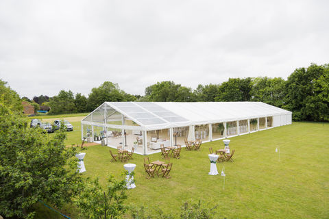 Large wedding marquee hire with beautiful clear lounge area.