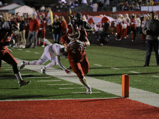Hurricane defeats South Charleston 31-20 to keep playoff hopes alive.