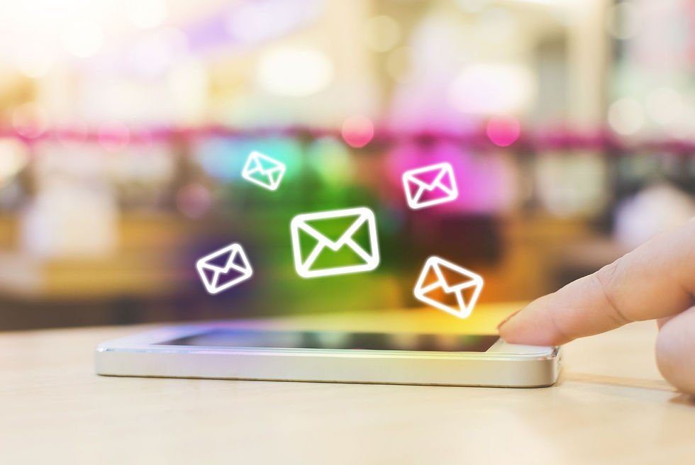 person sending marketing emails from their phone