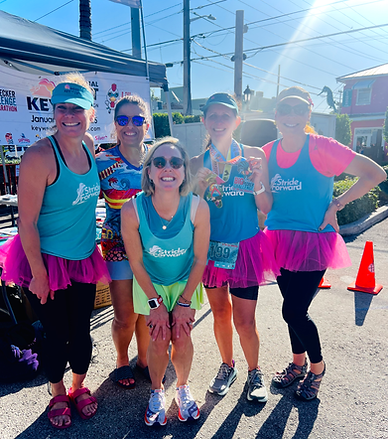 key west cohort celebrating at the finish line