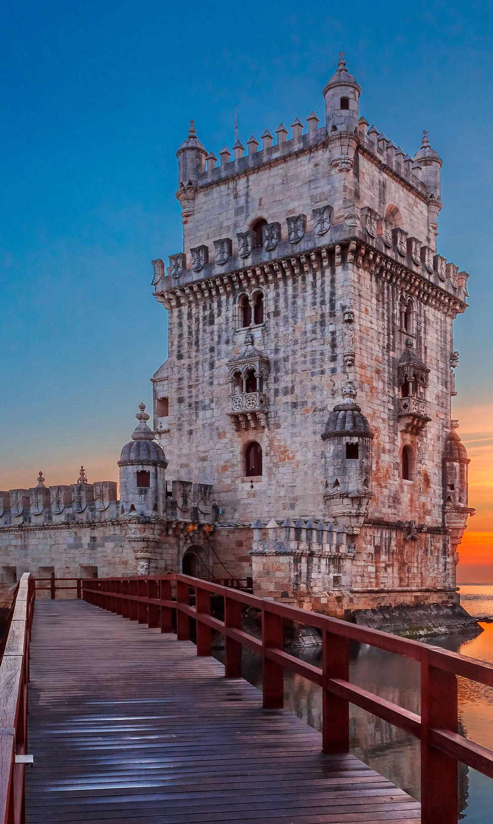 a castle nestled in the water somewhere in europe representing setting boundaries for a small business