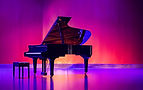 colorful image of a piano on a stage