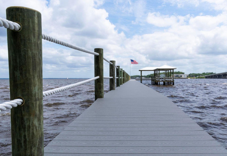 long view angle of a dock extending out into the st. johns river