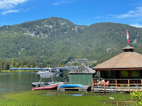 A seaplane on green lake in Whistler