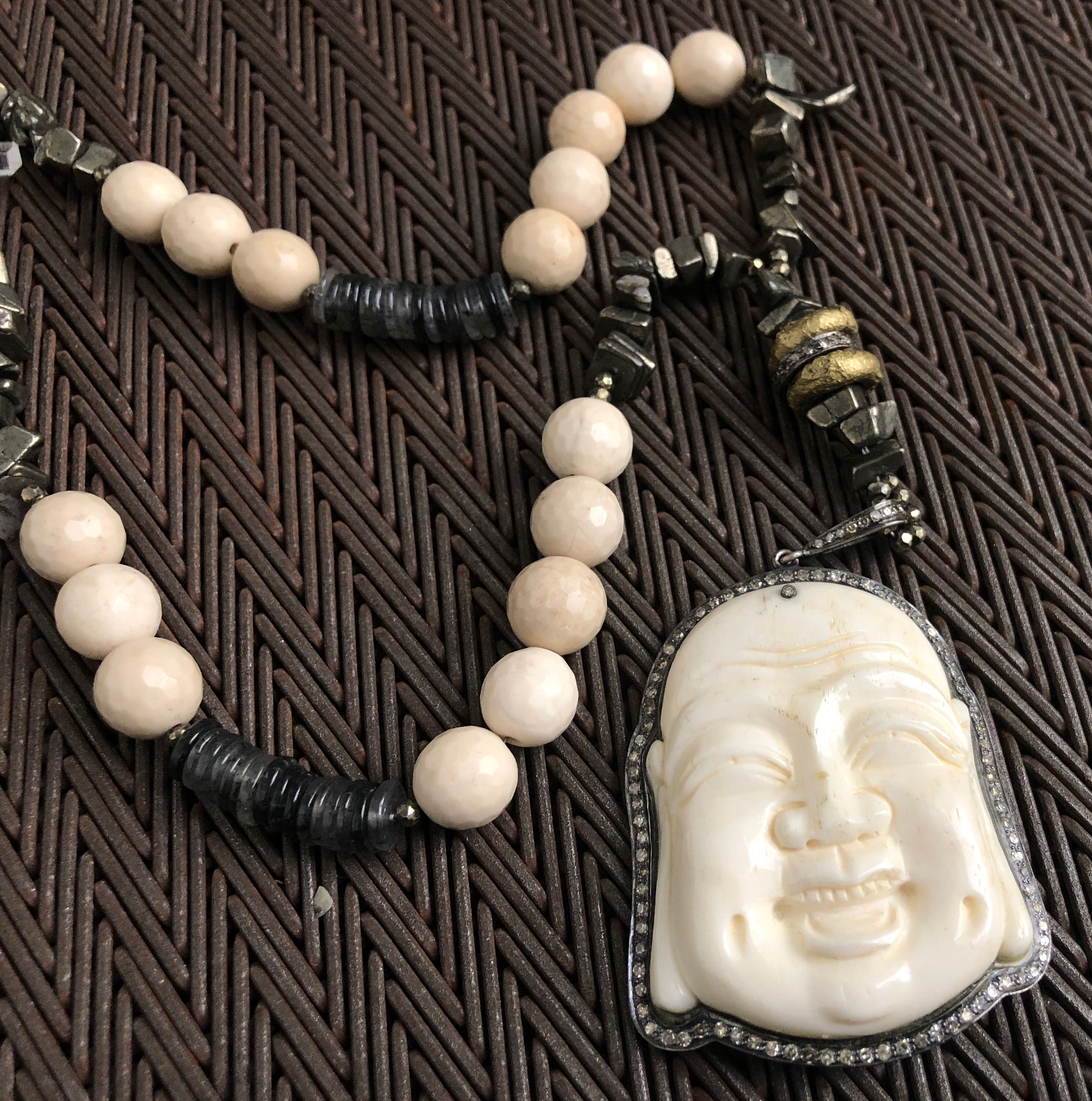 DIAMONDS, BONE, BRASS, PYRITE, RUTILATED QUARTZ, JASPER