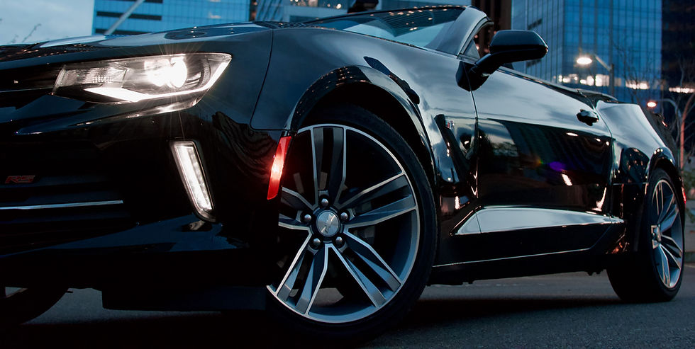 black convertible coupe parked near high-rise building_edited.jpg