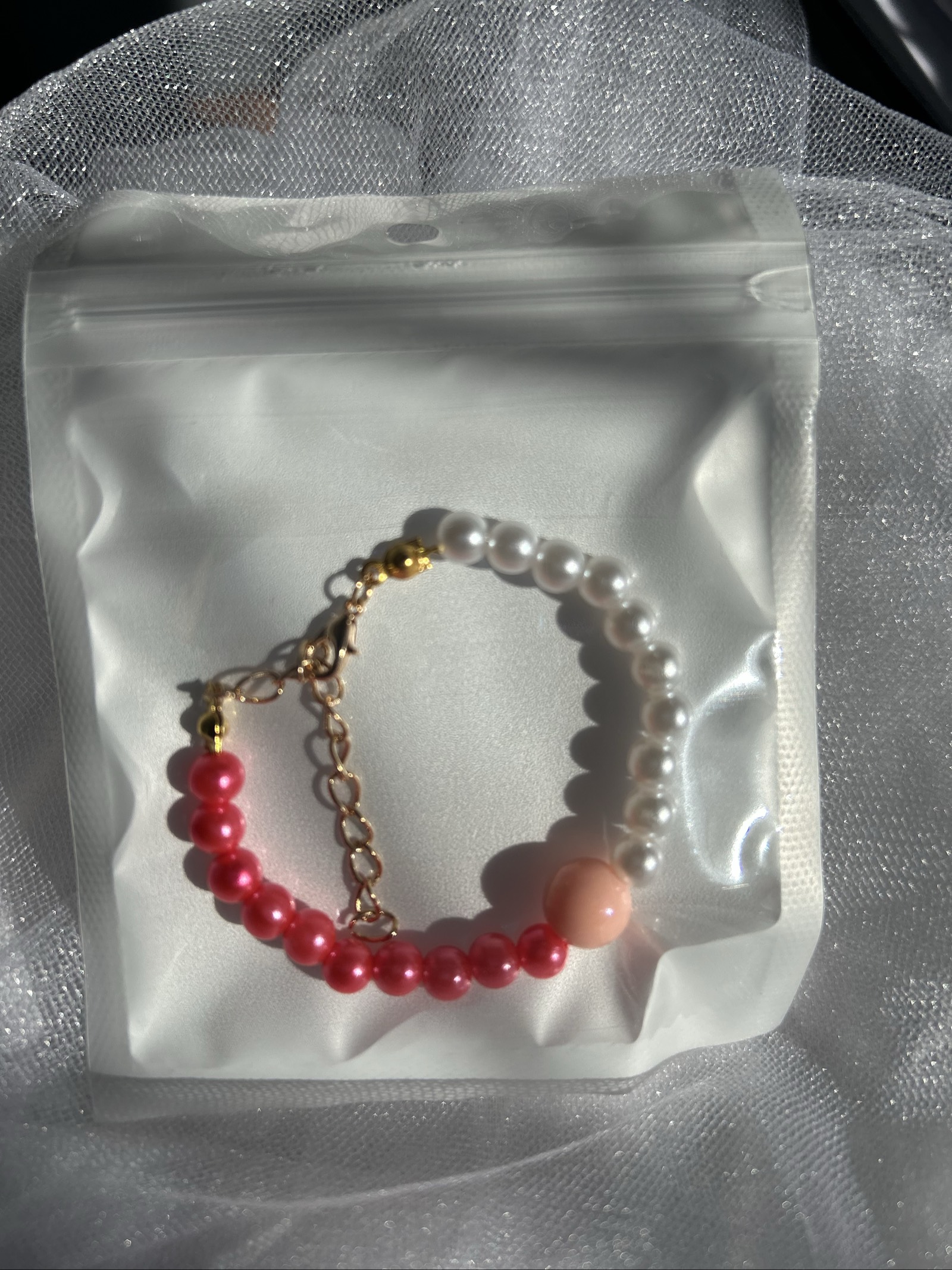 Bracelet en perles rose et blanc