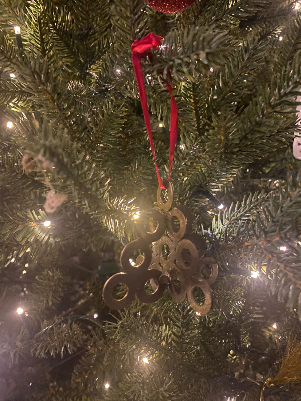 Hanging Christmas tree ornament welded out of washers