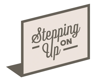 Stepping On UP Logo.webp