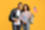 Study Abroad. Smiling Middle Eastern Students Couple Posing With American Flag In Hand, Ha