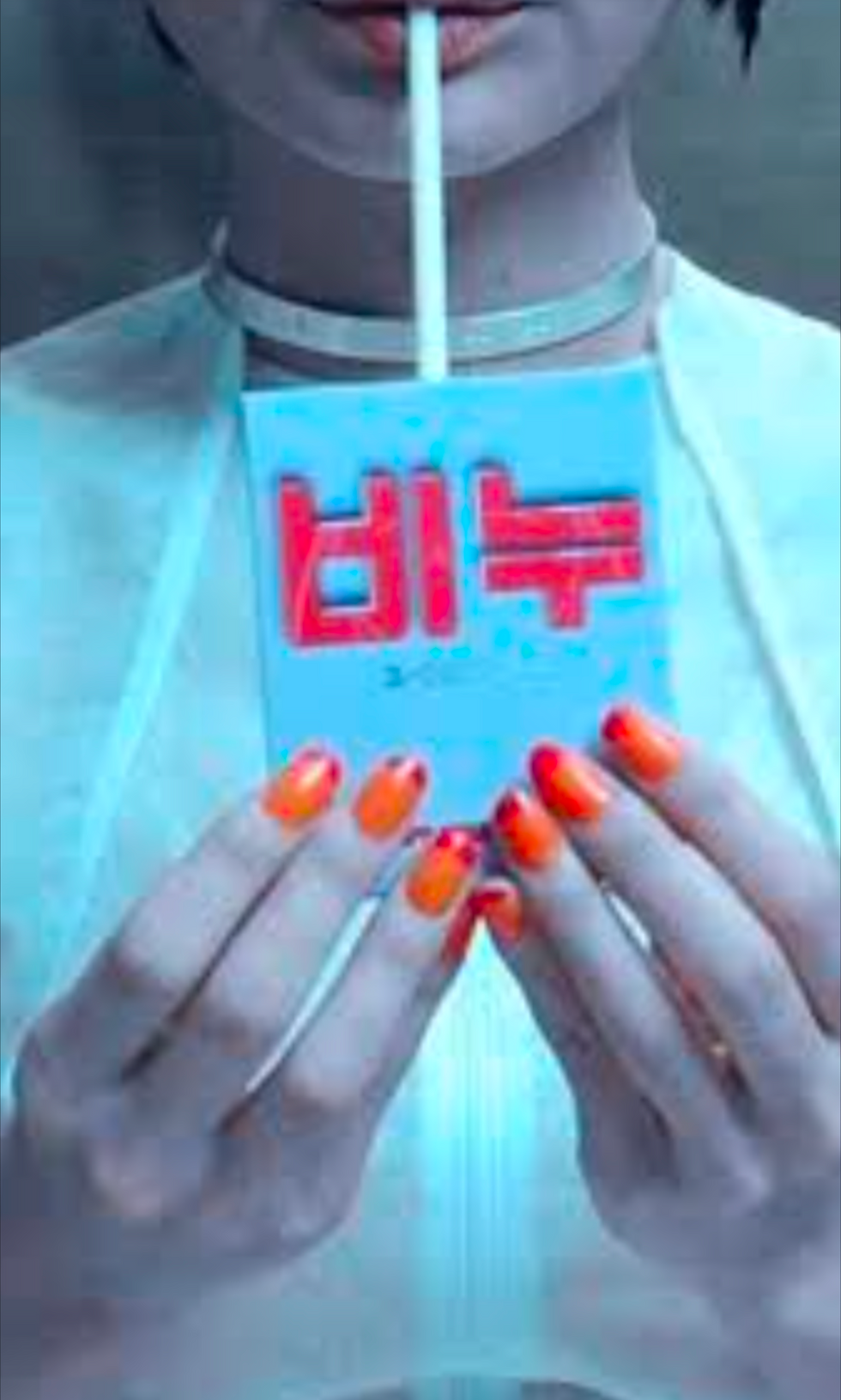 Cloud Atlas Movie screenshot of the Juice box made from the replicant. The words on the juice box is Korean for. 'Soap.'