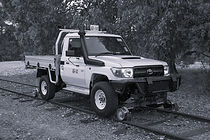 Land_cruiser_standard_gauge_hi-rail_vehicle_conversion BW.jpg