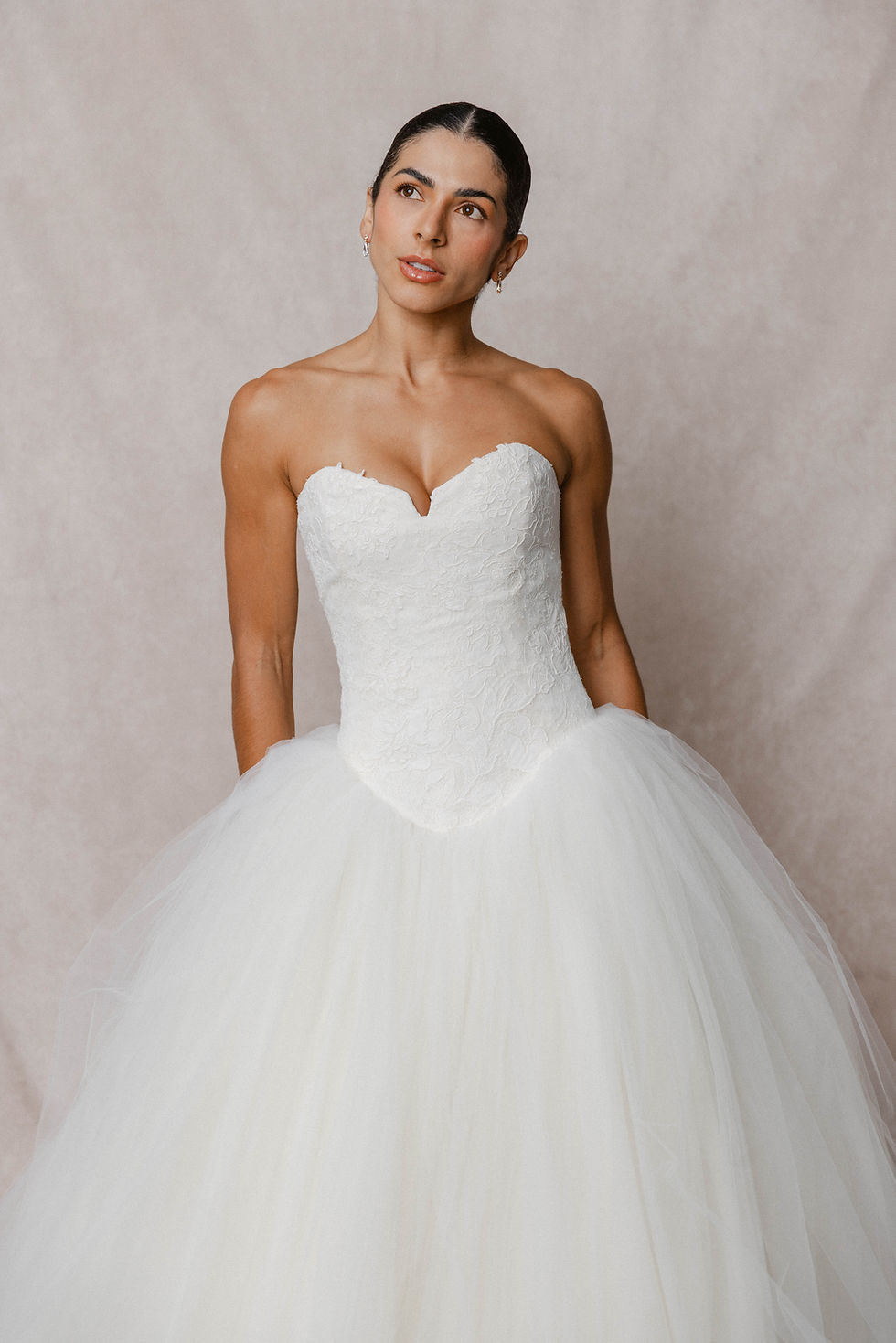 Model showing bodice and Basque waist detail of Vera Wang Bride Wars dress