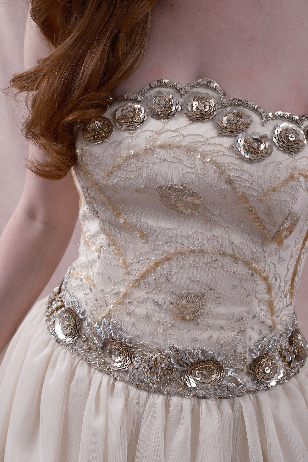 Thumbnail: Close-up details of beaded gold vintage Escada ball gown against beige backdrop