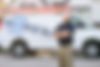 Another picture of Jacob, this time in front of our vans. Jacob is the owner and operator of our four locations in Texas.