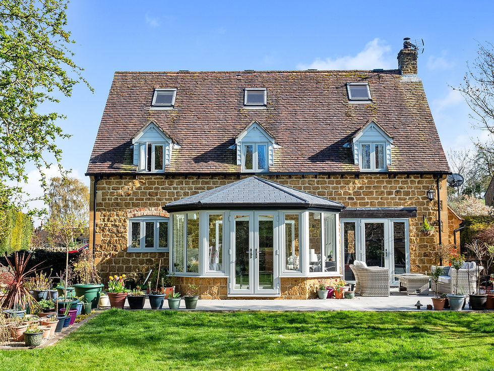 TIMBER-EFFECT WINDOWS & DOORS + ALUMINIUM BI-FOLDS